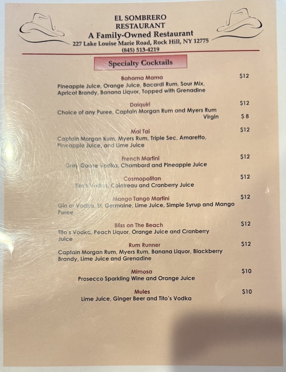 Menu page with appetizers, steaks, and desserts.