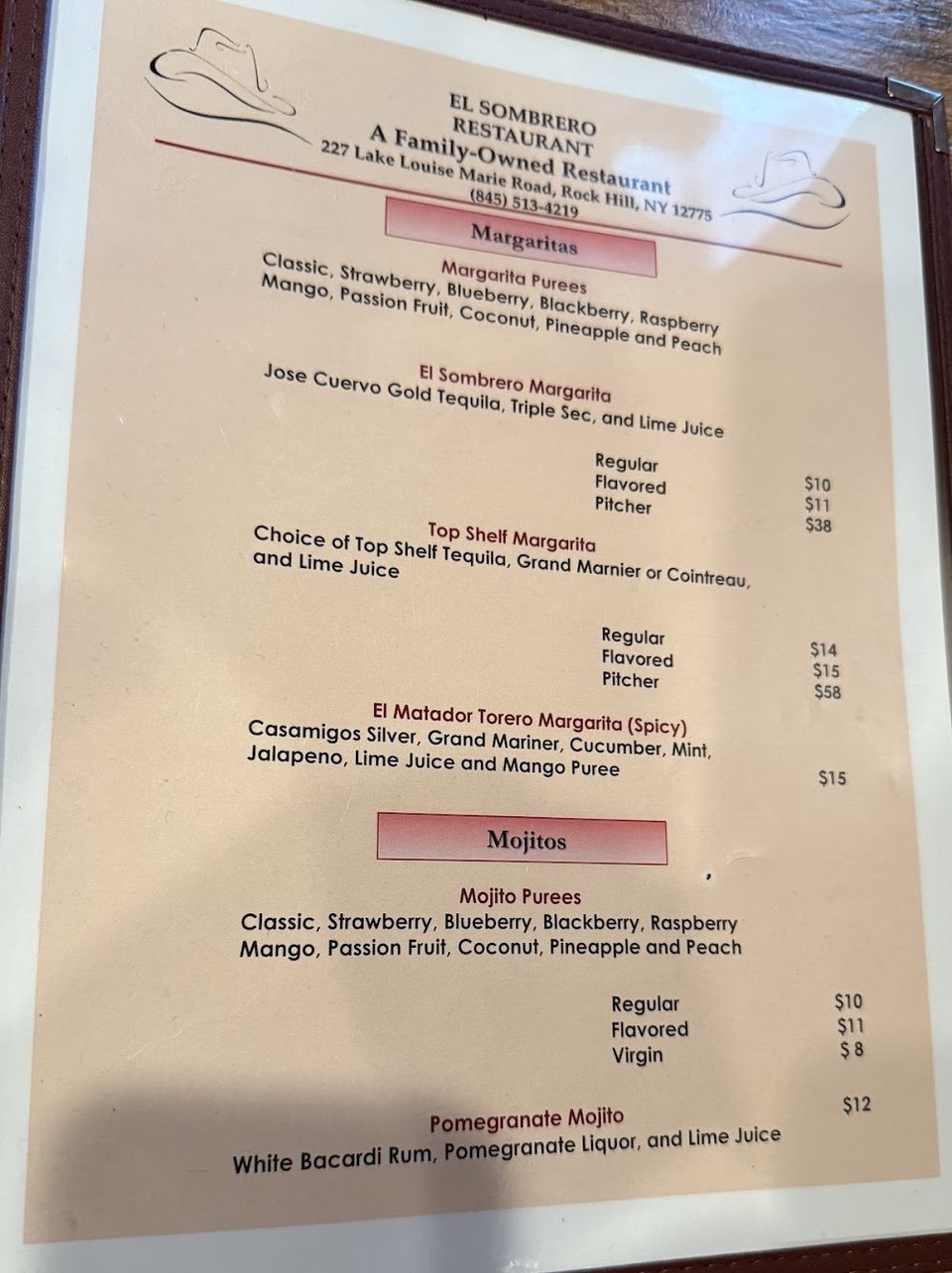 Printed menu showing guacamole, nachos, and cheesecake.